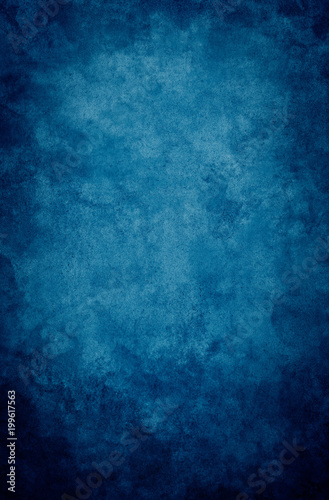 A textured, vintage paper background with a dark blue vignette. © DavidMSchrader