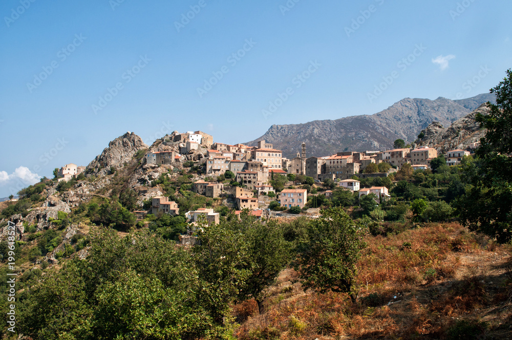 A small village in the hills above the sea on the island of Corsica