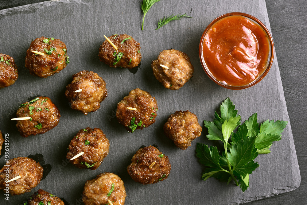 Fototapeta premium Meatballs with tomato sauce
