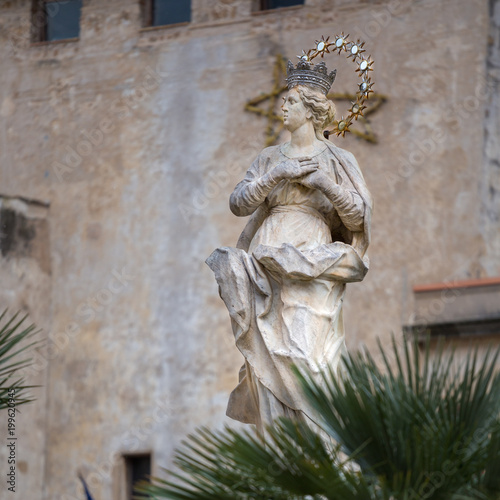 The statue of The Immaculate located in front of Monreale Cathedral on the Piazza Guglielmo II