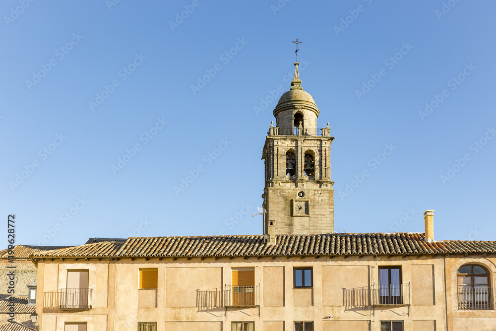 Buildings at Plaza mayor in Medinaceli town and Collegiate Church of our lady of Assumption, province of Soria, Spain
