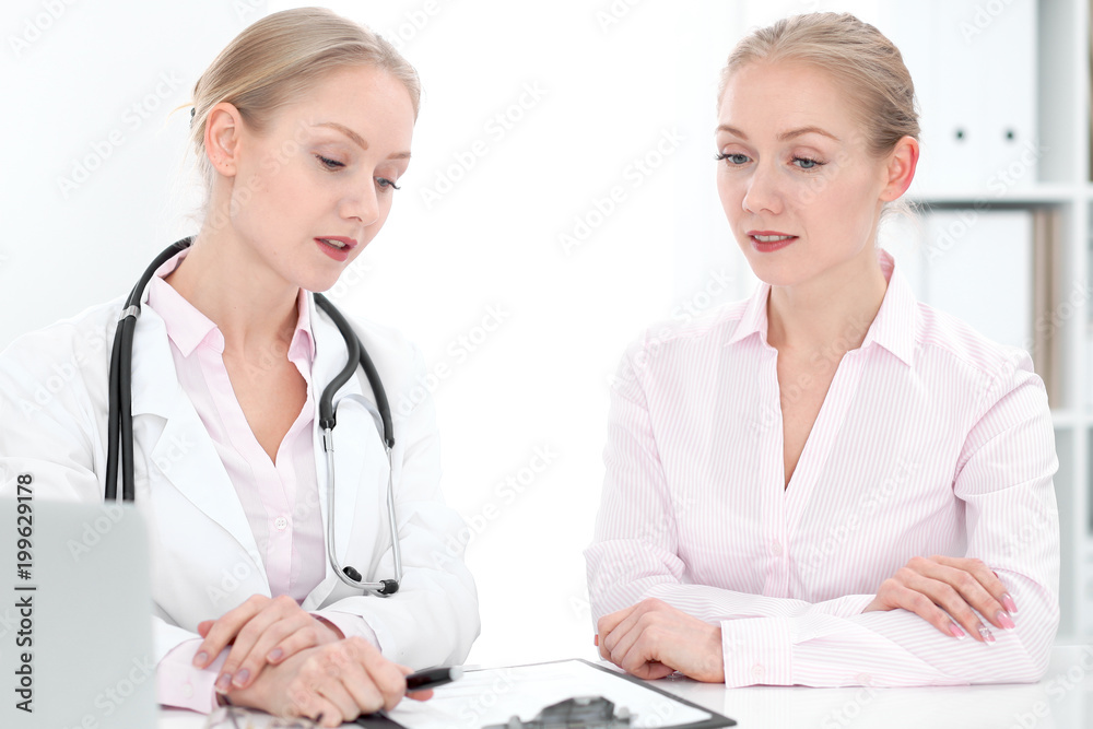 Doctor and patient during personal consulting in hospital Doctor and patient during personal consulting in hospital