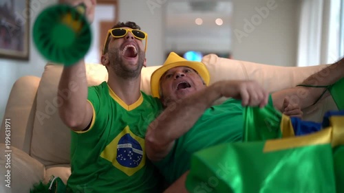 Father and Son Celebrating Brazil Victory