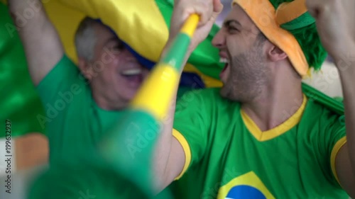 Father and Son Celebrating Brazil Victory