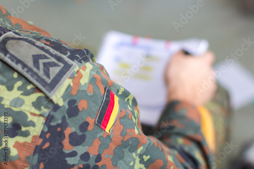 injured german soldier on a first aid exercise
