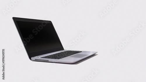 Modern laptop isolated on white background - left side