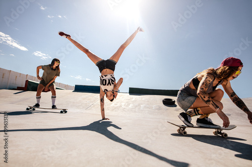 Female skaters enjoying at skate park