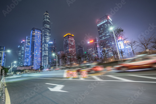 blurred road and modern office buildings at night © hallojulie
