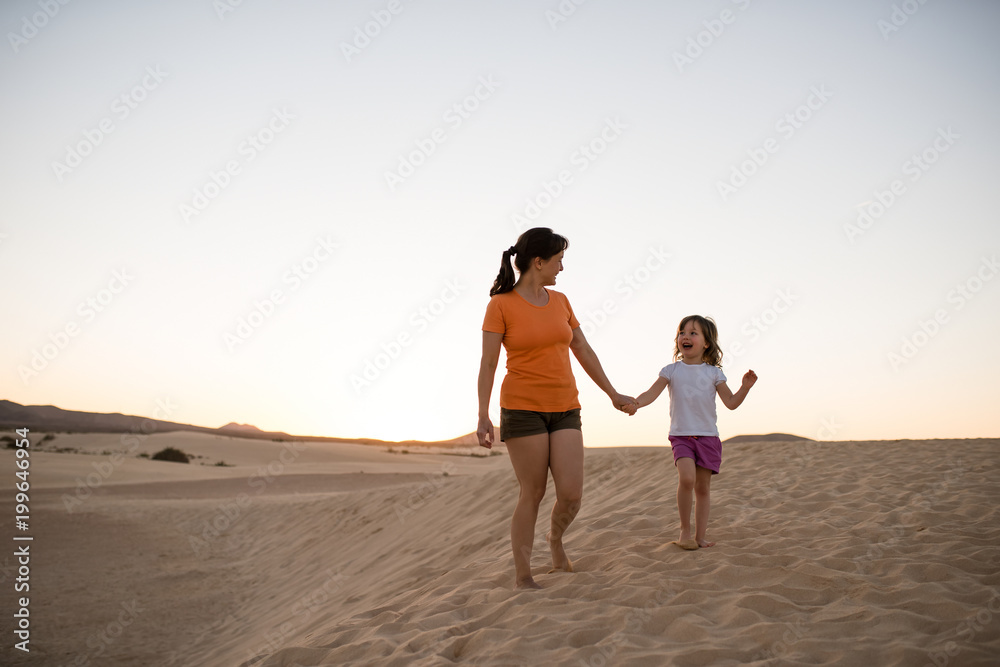 Happy little girl enjoying time with her mother