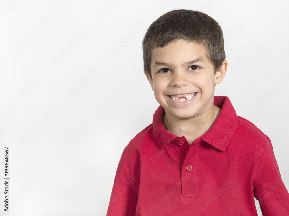 Cute little boy with missing teeth and happy smile isolated on white background Cute little boy with missing teeth and happy smile isolated on white background