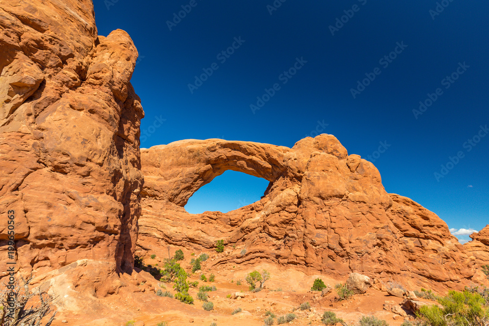 Beautiful autumn scenery in the Arches National Park, Utah, on a claer day with blue sky
