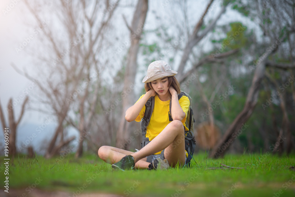 woman traveller upset and tired in lost of the way, lost direction in the rainforest,worry in upcoming everning alone staying in dark woman traveller upset and tired in lost of the way, lost direction in the rainforest,worry in upcoming everning alone staying in dark