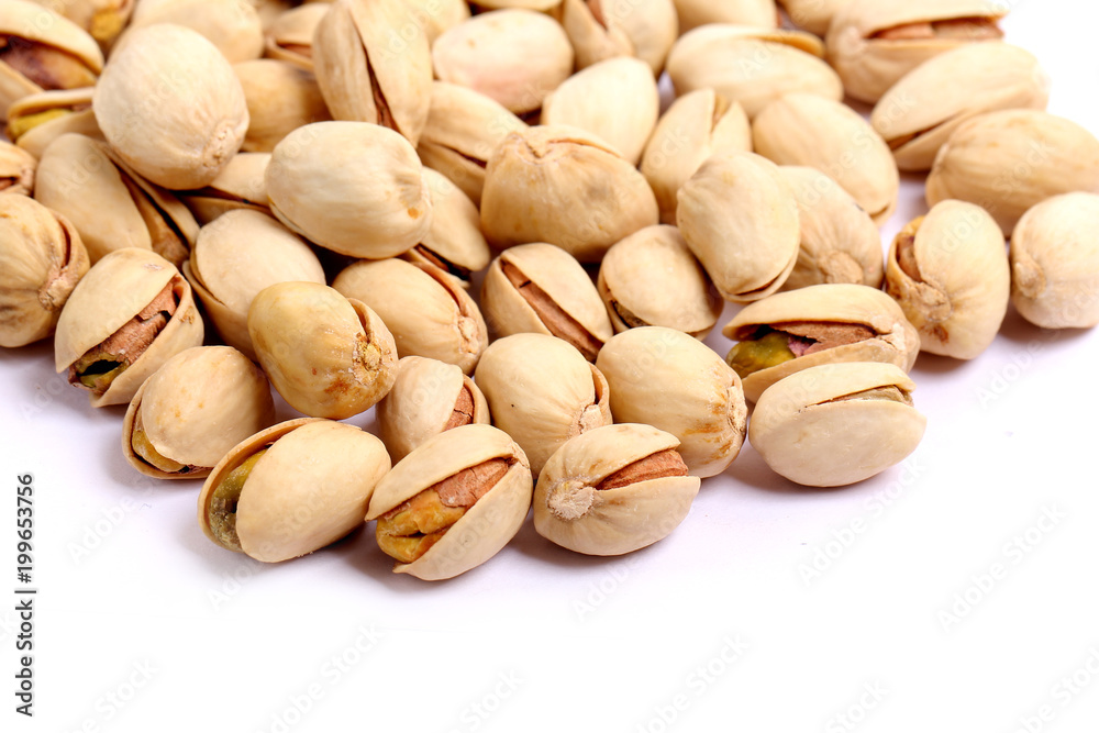 Unshelled roasted and salted cashew nuts isolated on white background Unshelled roasted and salted cashew nuts isolated on white background