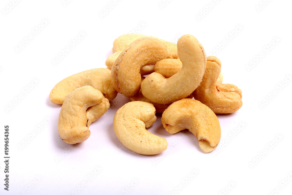 Unshelled roasted and salted cashew nuts isolated on white background Unshelled roasted and salted cashew nuts isolated on white background