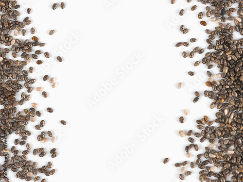Chia seeds with copy space. Isolated on white. Top view or flat lay. Healthy food and diet concept
