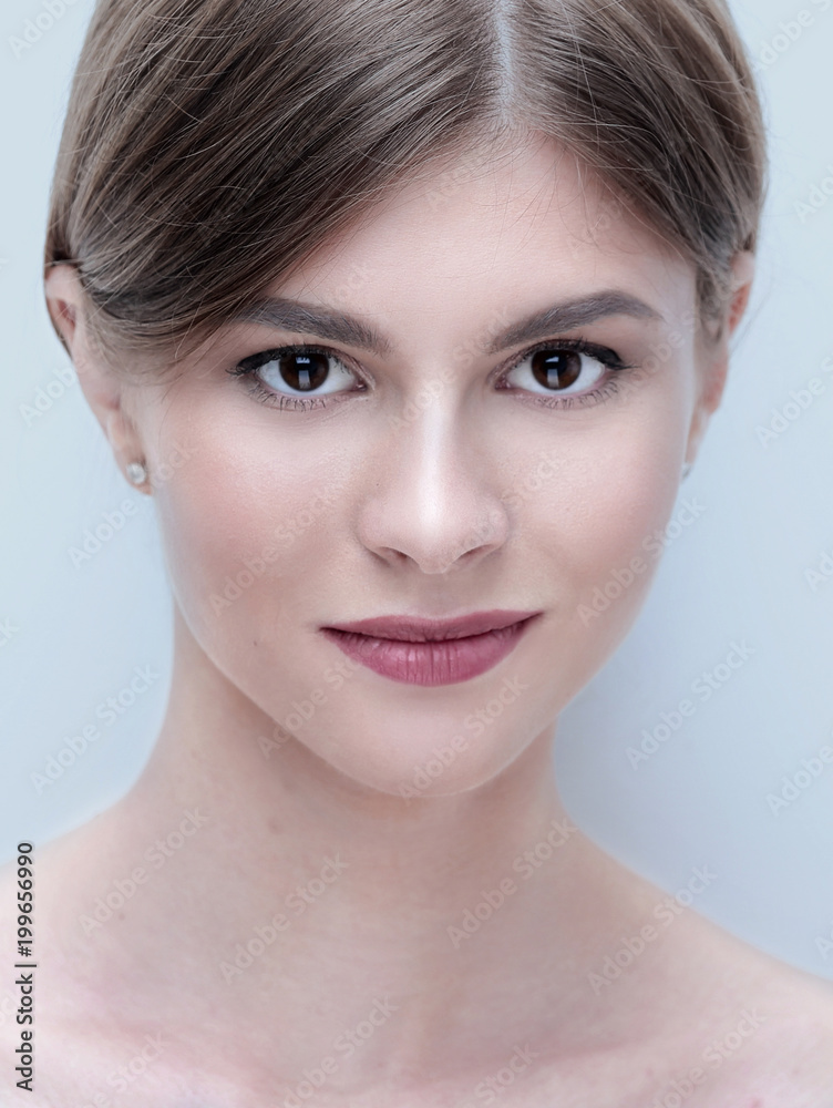 closeup face of a beautiful young woman. closeup face of a beautiful young woman.