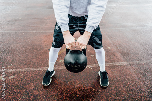 amateur weight training with kettlebell weight