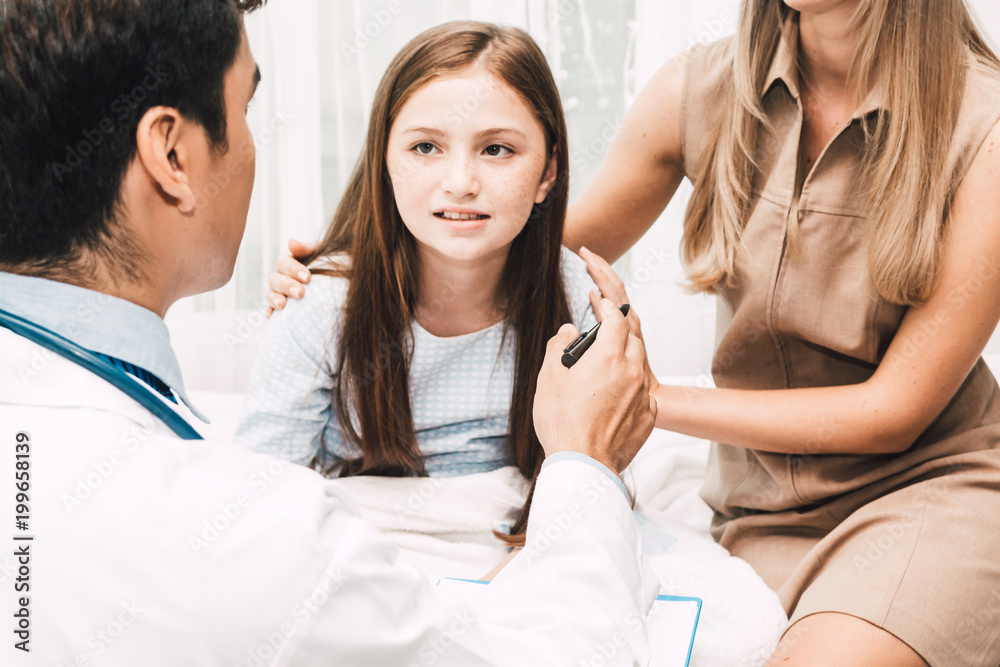 Fototapeta premium Doctor check up information with little girl and mom in hospital.healthcare and medicine