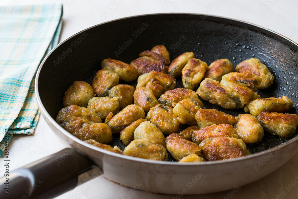 Fried Crispy Mussels Cooked in Pan. Fried Crispy Mussels Cooked in Pan.