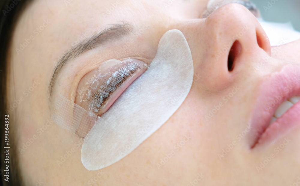 Beauty treatment. lash lamination. Closeup face and eyes. Beauty treatment. lash lamination. Closeup face and eyes.
