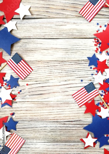 American independence Day, celebration, patriotism and holidays concept - flags and stars on the 4th of July party on top on wooden background