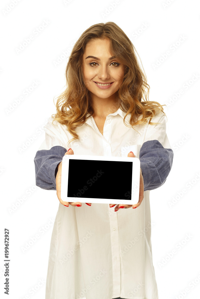 Young pretty woman holding empty tablet in hands over white background Young pretty woman holding empty tablet in hands over white background