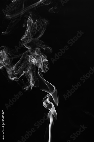 white smoke incense isolated on black background.