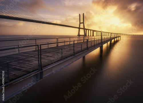 Obraz most i droga do słońca