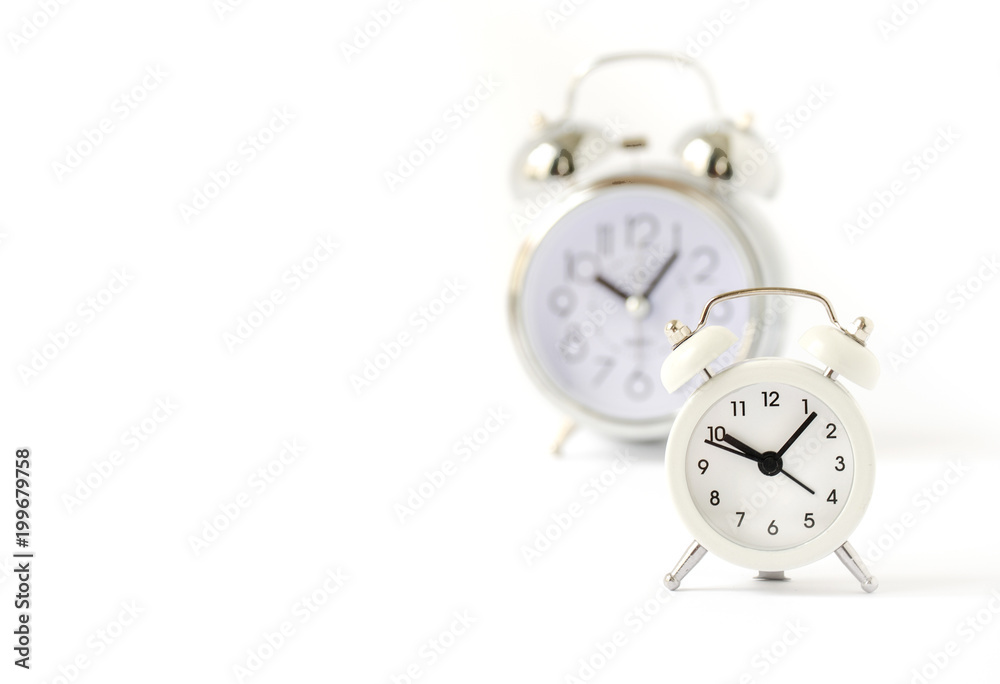 Classic bell alarm clocks on white background with copy space