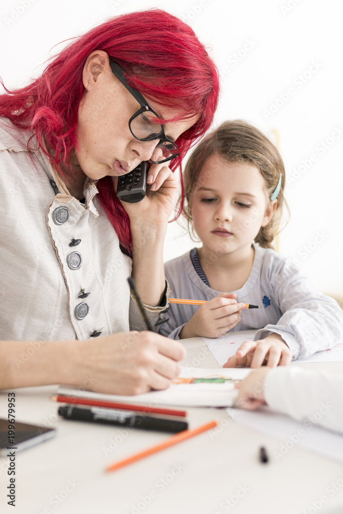 Mother Talking on the Phone While Drawing as Kid Watches Mother Talking on the Phone While Drawing as Kid Watches