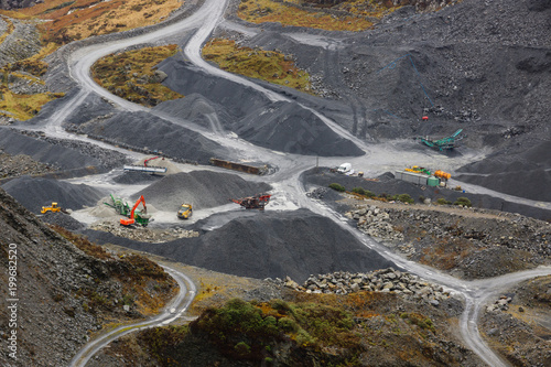 Modern crushed slate mining operation at the Llechwedd Maenofferen quarry near Blaenau Ffestiniog in North Wales producing decorative stone chips for the world wide market photo