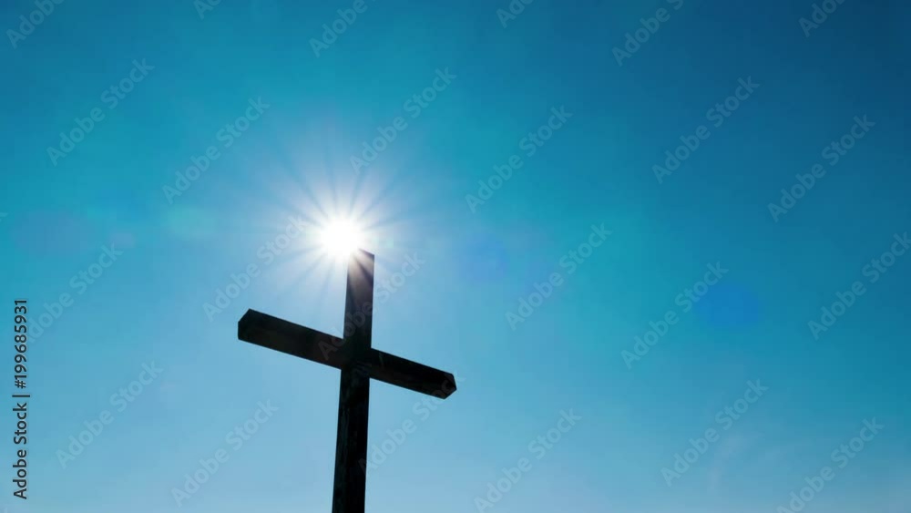 4K. Cross and  sun  with clouds Timelapse. Blue sky


