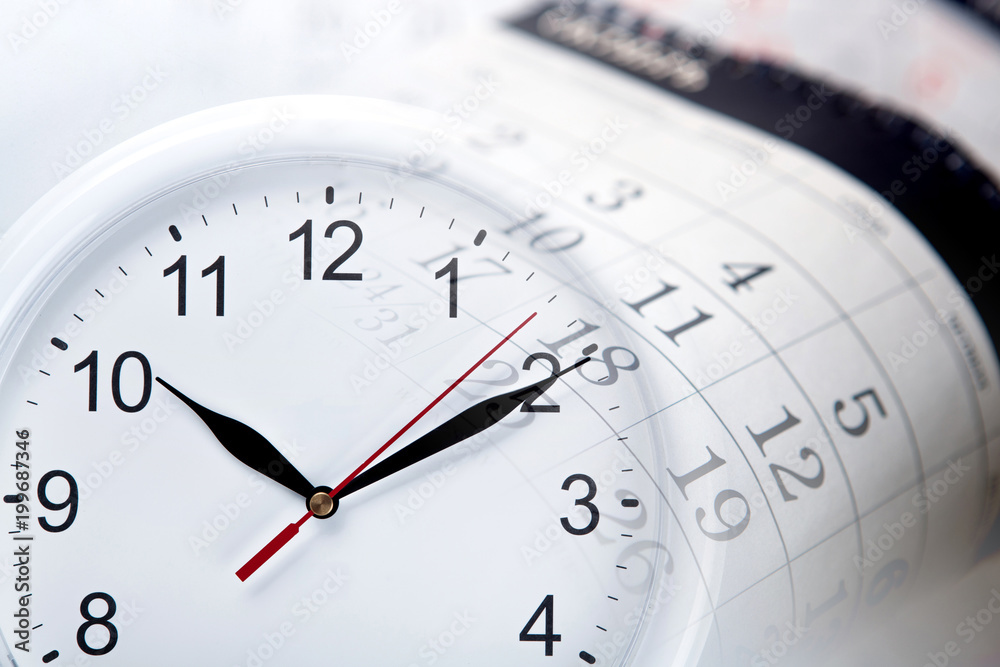 wall calendar with the number of days and clock