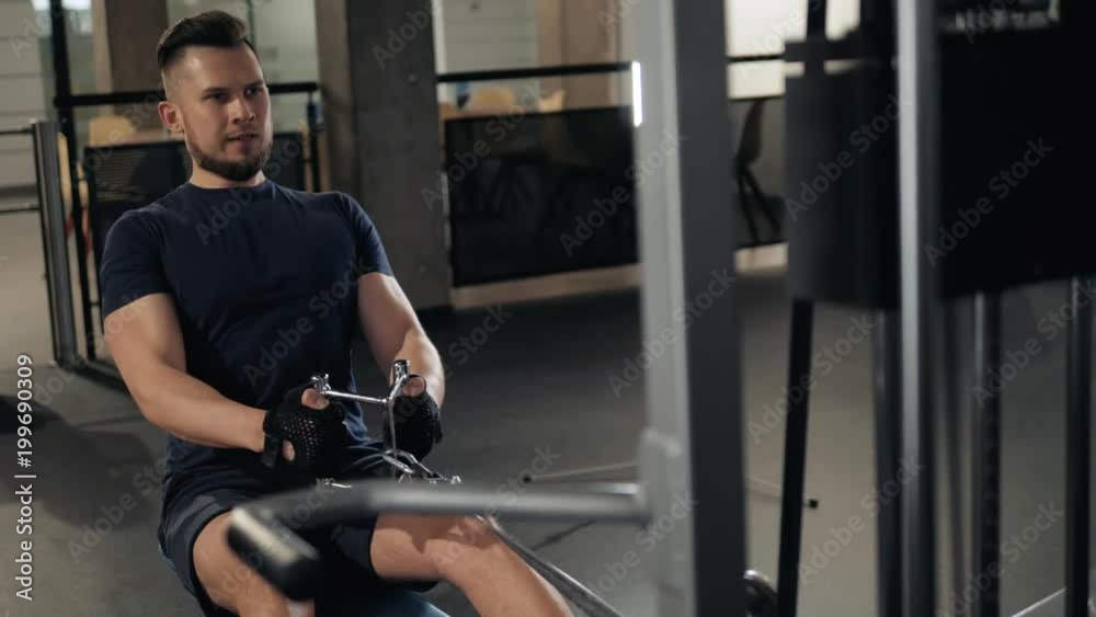 very power athletic guy bodybuilder, execute exercise with gym machine barbell, indoor crossfit man boxer very power athletic guy bodybuilder, execute exercise with gym machine barbell, indoor crossfit man boxer