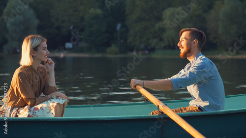 Attractive couple in a boat