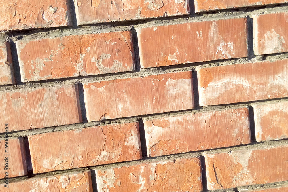 Fototapeta premium Brick red wall obliquely