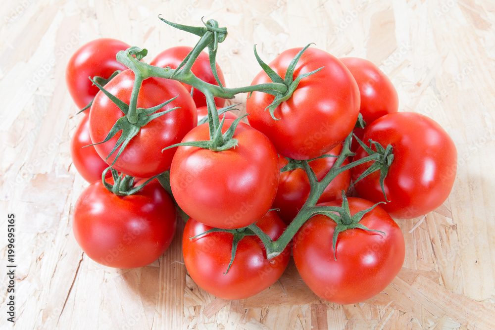 cluster of small red cherry tomatoes cluster of small red cherry tomatoes