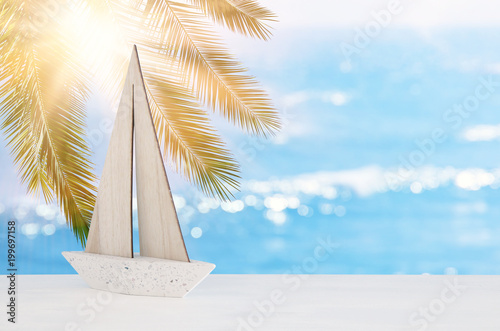 nautical concept with white boat over tropical sea landscape background.