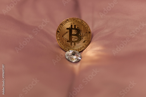 bitcoin coin on a wool background photo