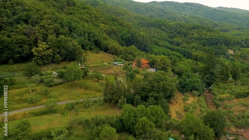 Aerial over the mountains and villages in Tuscany region of Italy. photo