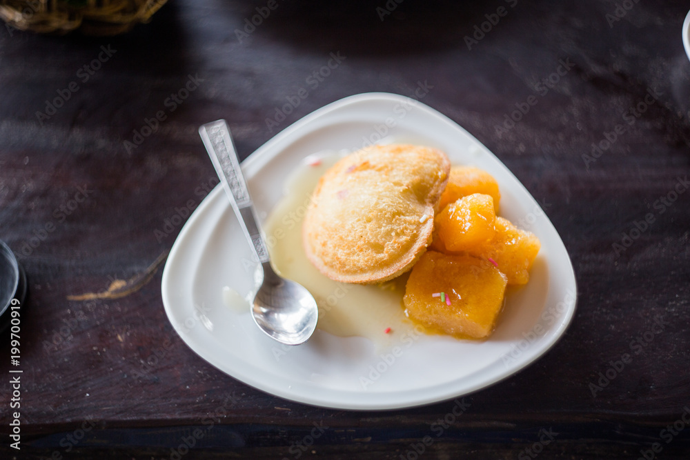 Deep fried a mango ice cream with mango jam Deep fried a mango ice cream with mango jam