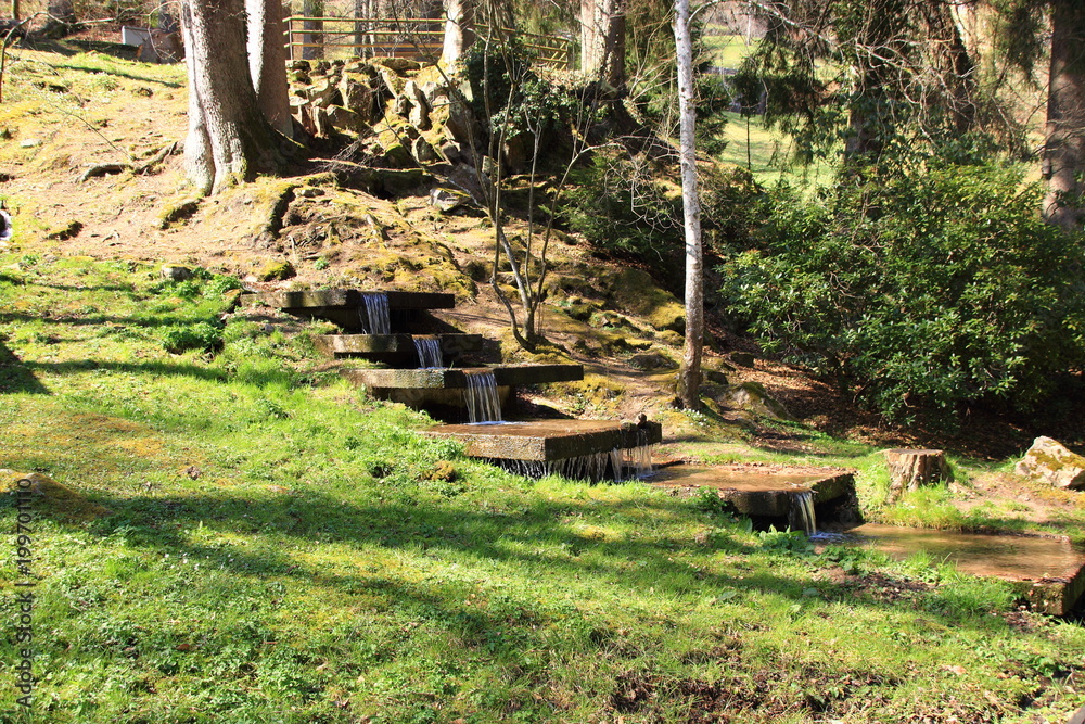 Wasserlauf im Kurpark von Bad Wildbad im Schwarzwald Wasserlauf im Kurpark von Bad Wildbad im Schwarzwald