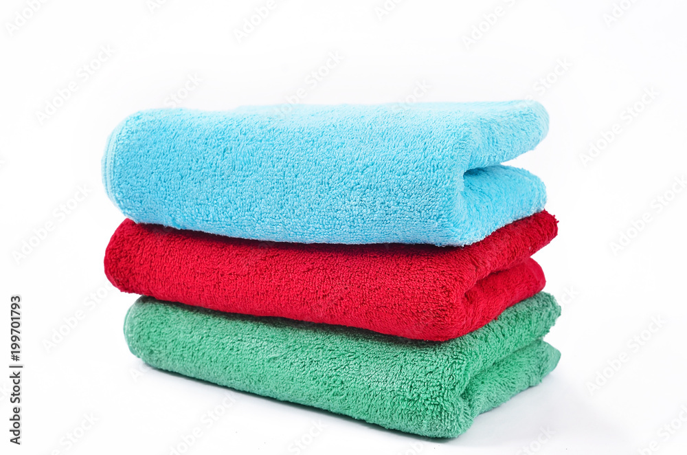 three frotte towels, bedroom towel on white backgroung three frotte towels, bedroom towel on white backgroung