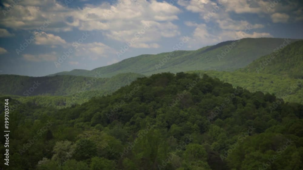 Beautiful view of spring in the Appalachian mountains of West Virginia and Maryland as clouds float over the landscape. Beautiful view of spring in the Appalachian mountains of West Virginia and Maryland as clouds float over the landscape.