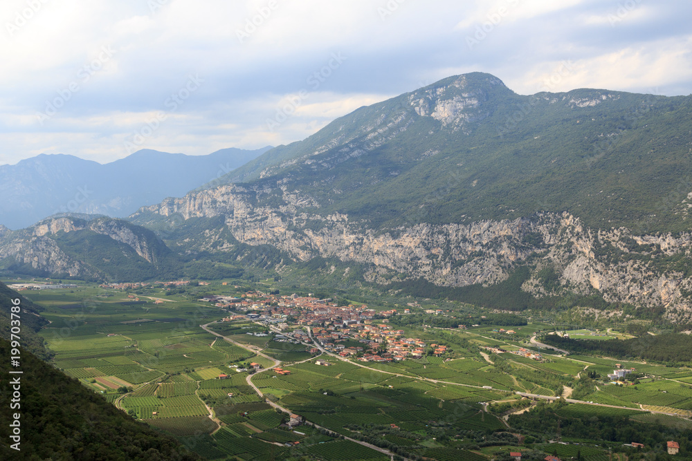 Townscape of village Dro with mountain panorama near Lake Garda, Italy