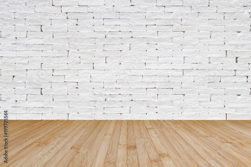 Brick wall painted in white with wooden floor textured background in natural yellow brown