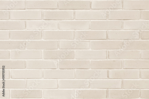 Seamless design vintage style light sepia cream tone brick wall detailed pattern textured background
