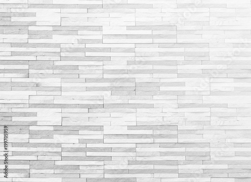 Marble rock stone brick tile wall texture pattern background in white grey color