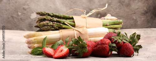 White and green asparagus with strawberries