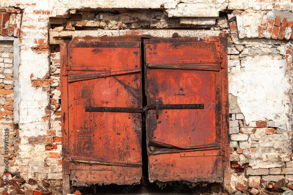 Naklejka premium Fragment of the ancient wall of the temple, gates, brickwork
